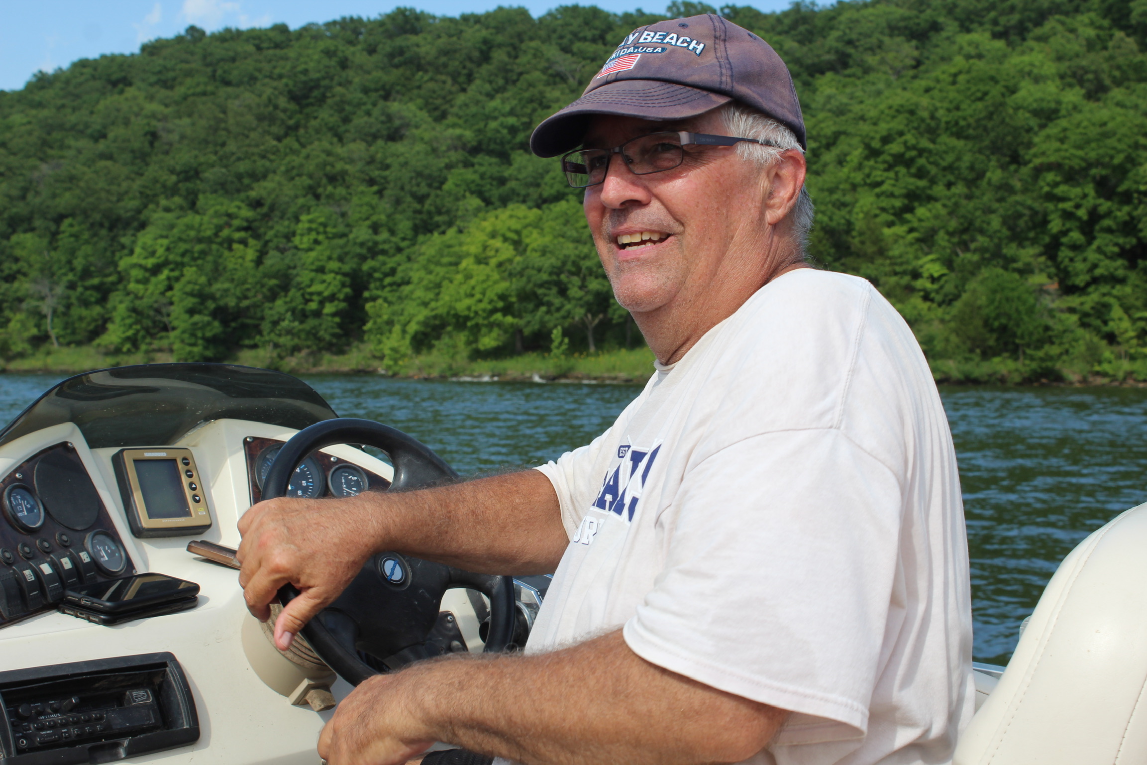 Joe Huser at the helm on the Lake of the Ozarks